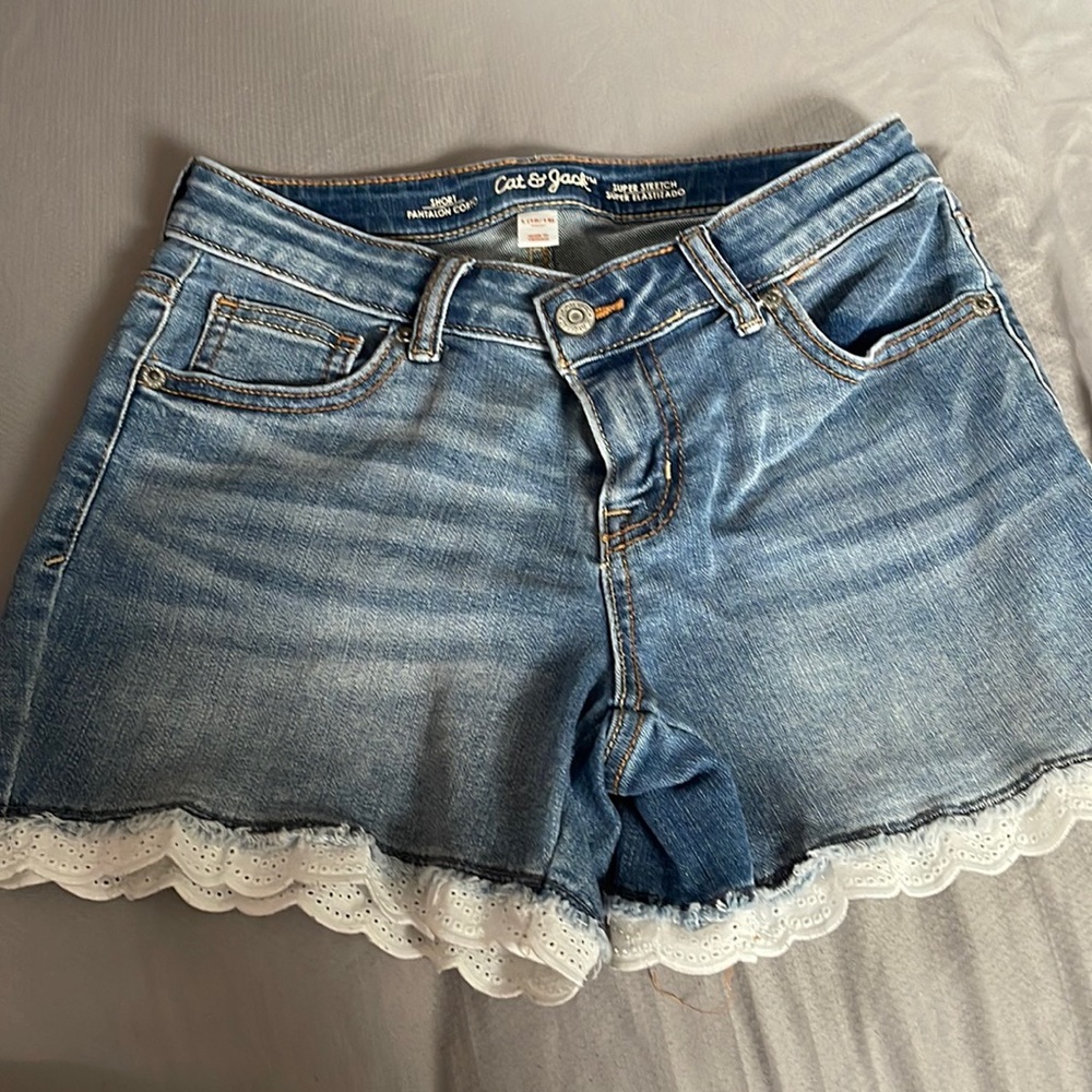 Gently used Cat & Jack shorts. Size L 10/12. Super stretch jean material w/lace